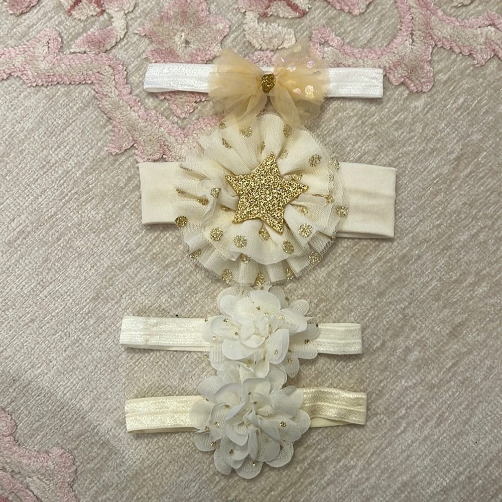 Never used - set of 4 misc. gold and white baby girl headbands